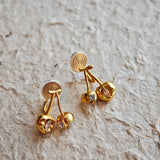 These cherry-shaped stud earrings feature a luxurious matte sandblasted finish, crafted from thick-plated real gold over 925 sterling silver posts. Each earring is designed as a pair of cherries, adorned with a marquise-cut and a round-cut sparkling clear stone, adding a delicate, eye-catching sparkle. The playful, organic cherry silhouette and premium gold plating make them a chic, elegant accessory for everyday wear.