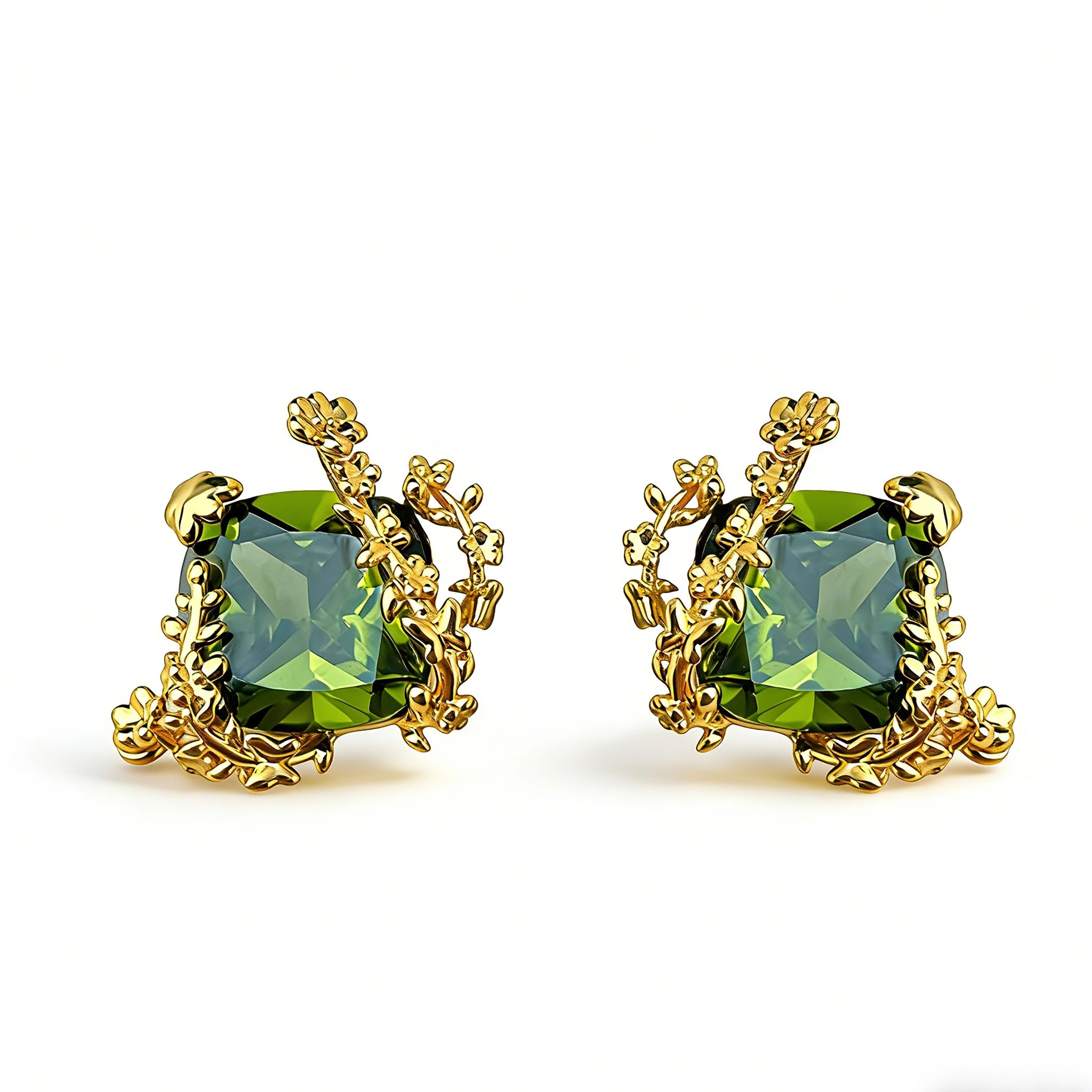 These stud earrings feature cushion-cut olive-green cubic zirconia stones, each encircled by delicate, nature-inspired gold floral and vine detailing. The thick 18K gold plating lends a rich, warm luster, contrasting beautifully with the deep green cubic zirconia to create an elegant, botanical aesthetic.
