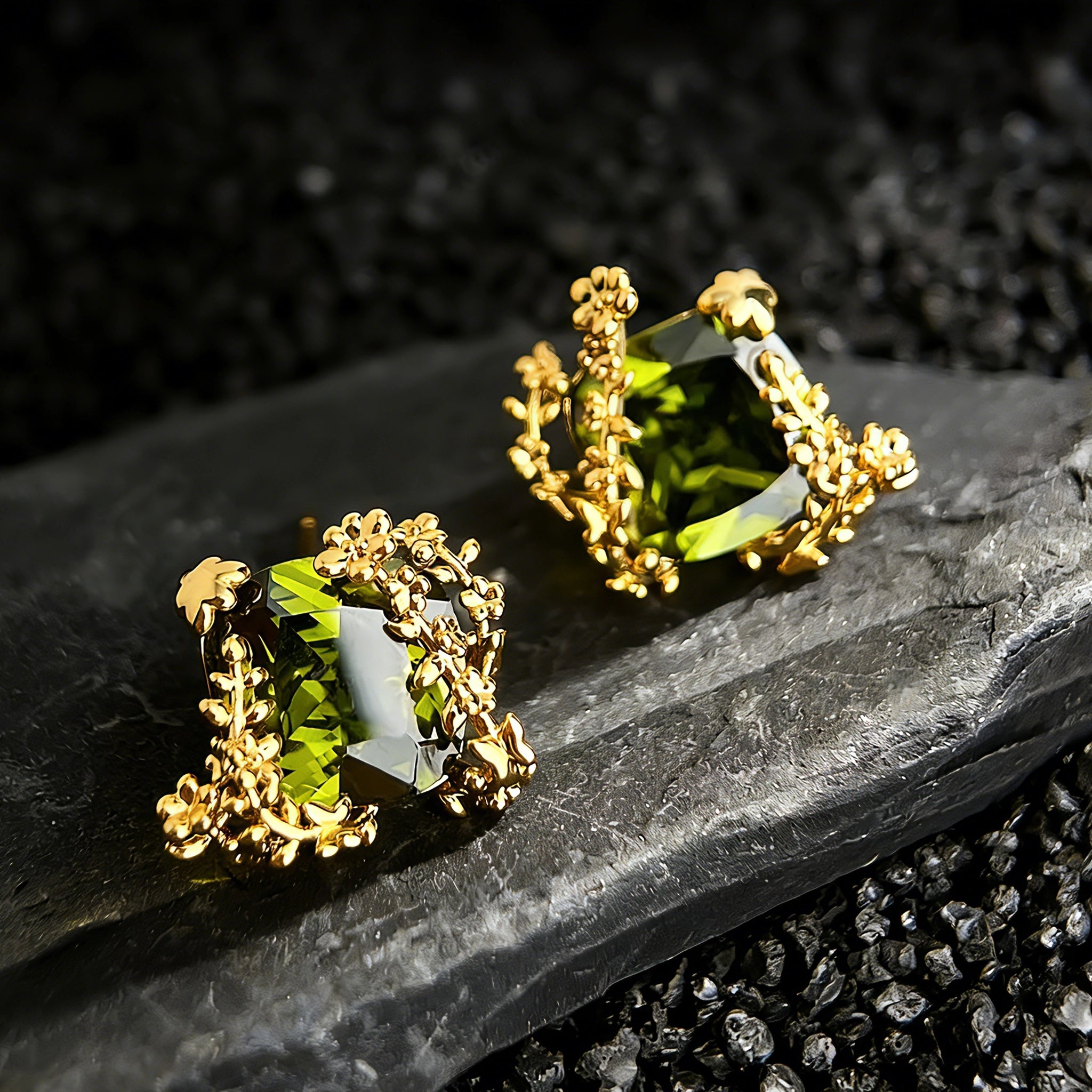 These stud earrings feature cushion-cut olive-green cubic zirconia stones, each encircled by delicate, nature-inspired gold floral and vine detailing. The thick 18K gold plating lends a rich, warm luster, contrasting beautifully with the deep green cubic zirconia to create an elegant, botanical aesthetic.