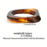 Crafted from translucent acrylic, these amber marbled bangles feature organic swirling tones for a vintage aesthetic. The 3-piece set includes varied shapes that stack beautifully, adding earthy retro charm to any outfit. Smooth, polished surfaces deliver a lightweight, comfortable wearing experience.