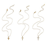 This 3-piece stainless steel cross necklace set features three distinct cross pendants, including crystal-encrusted styles and an ornate floral cross. Crafted in polished gold tone, the delicate thin chains are perfect for trendy layered stacking looks. Waterproof and durable, these dainty cross necklaces deliver timeless vintage charm for everyday wear.