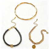 This vintage-inspired 3-piece bracelet set features a wavy gold bangle, engraved stainless steel bead chain and mixed black braided cord bracelet. Crafted from durable stainless steel, this stackable jewelry delivers timeless east-meets-west aesthetics for effortless layered styling. It is a versatile everyday accessory to elevate casual and chic outfits.