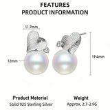 This minimalist pair of silver pearl stud earrings cleverly combine a chic silver heart-shaped pendant (11.7 mm wide) with a striking pearl teardrop (total height: 19.4 mm), with the pearl beneath the heart, creating a unique and stylish silhouette.