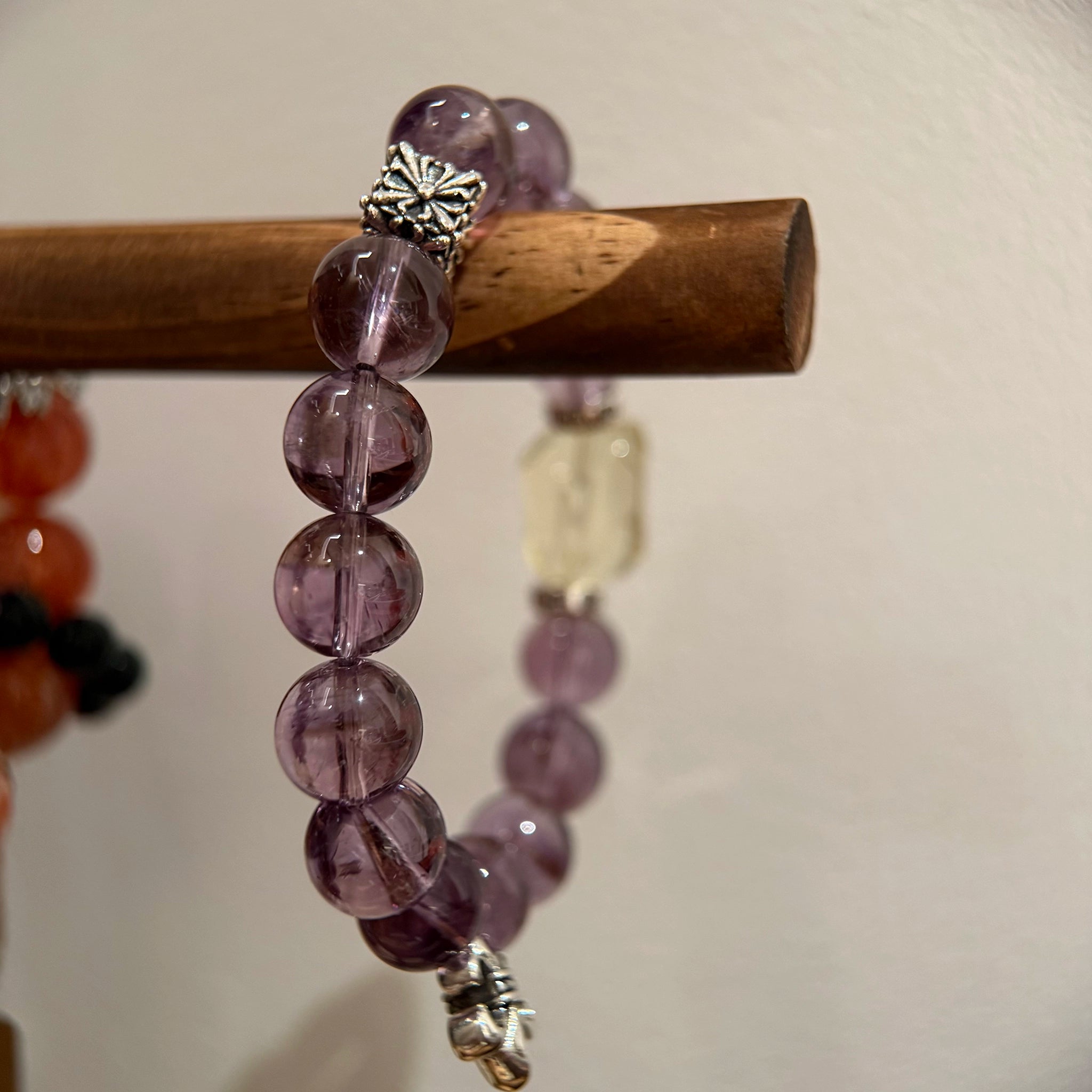 Wear a galaxy of amethyst violet, citrine sunlight and sterling stardust—this crystal bracelet turns every gesture into heart-stealing sparkle.