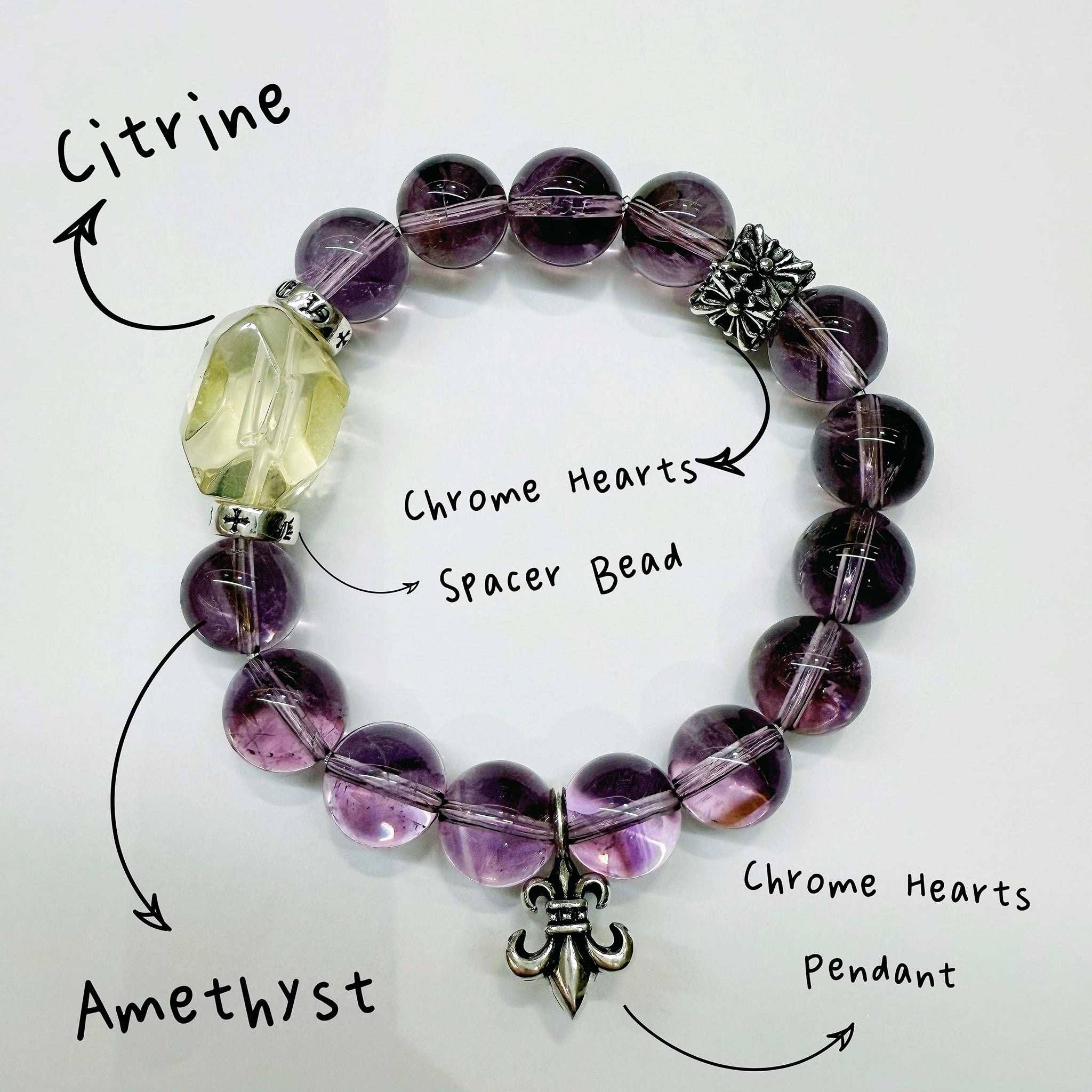 Soft amethyst gemstones circle your wrist, met by a citrine ray and twinkling silver accents—an intoxicating crystal bracelet for daily elegance.