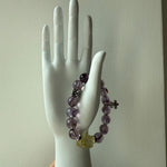 From casual denim to evening silk, the purple-gold-silver palette of this crystal bracelet earns compliments everywhere.
