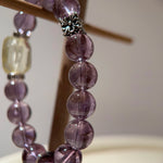 From violet amethyst dreams to citrine dawn and sterling comet trails, this crystal bracelet bottles twilight wonder around your wrist.