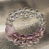 This handcrafted bracelet blends the serene clarity of clear quartz with the dreamy, calming energy of amethyst. The gradient of purple and clear beads creates a timeless, elegant look, perfect for bringing balance, intuition, and positive energy to your everyday style. A stunning piece for crystal lovers and minimalist jewelry enthusiasts alike.