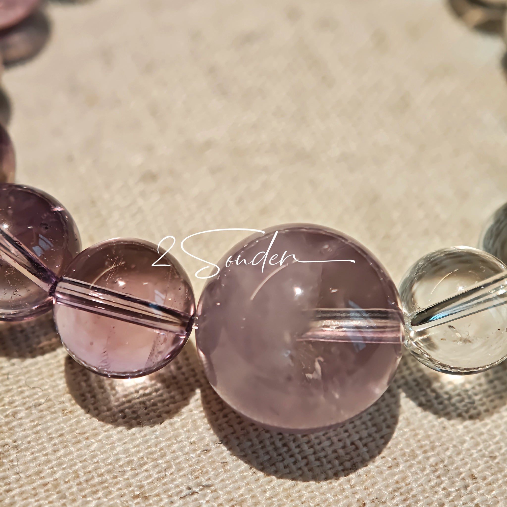 This handcrafted bracelet blends the serene clarity of clear quartz with the dreamy, calming energy of amethyst. The gradient of purple and clear beads creates a timeless, elegant look, perfect for bringing balance, intuition, and positive energy to your everyday style. A stunning piece for crystal lovers and minimalist jewelry enthusiasts alike.