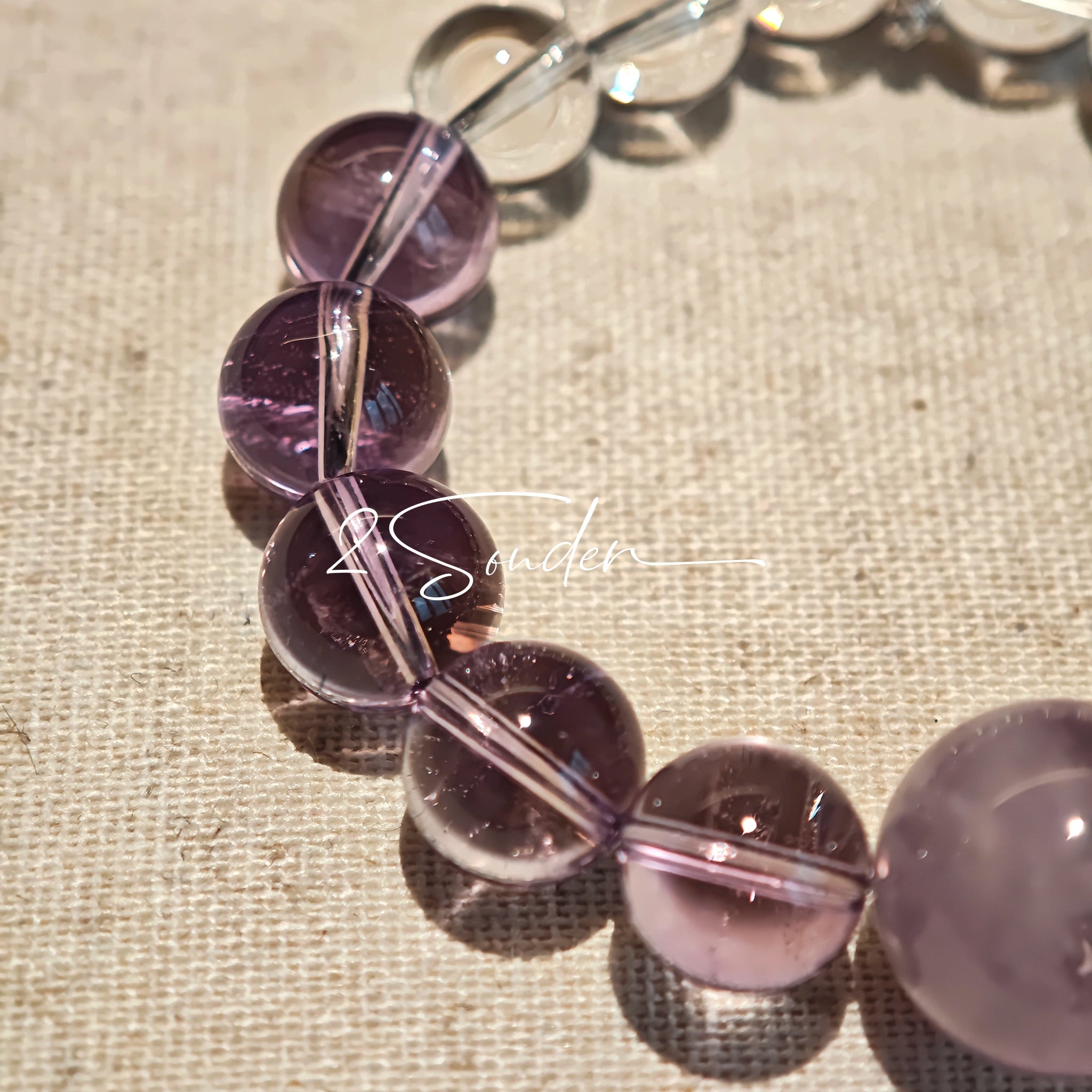 This handcrafted bracelet blends the serene clarity of clear quartz with the dreamy, calming energy of amethyst. The gradient of purple and clear beads creates a timeless, elegant look, perfect for bringing balance, intuition, and positive energy to your everyday style. A stunning piece for crystal lovers and minimalist jewelry enthusiasts alike.