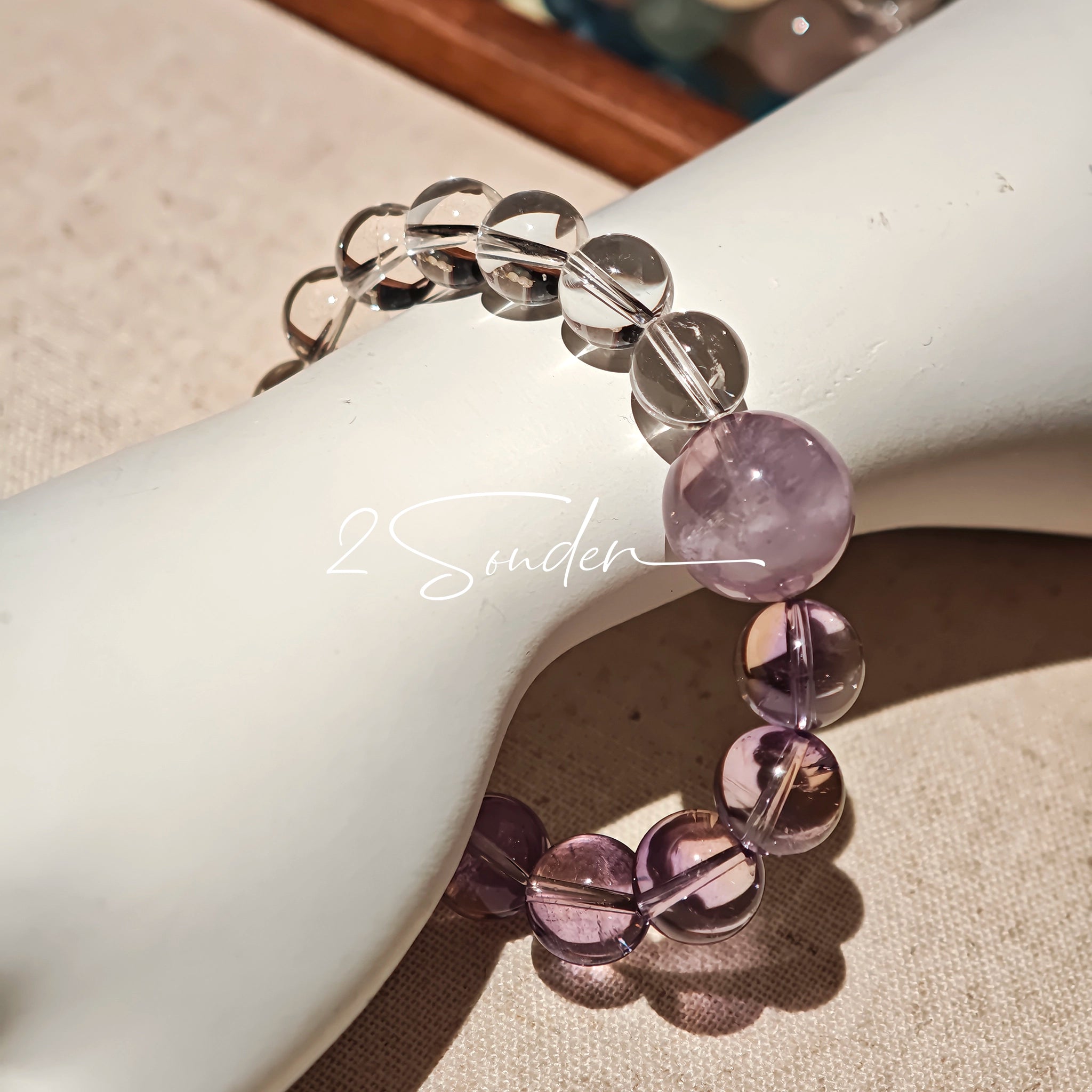 This handcrafted bracelet blends the serene clarity of clear quartz with the dreamy, calming energy of amethyst. The gradient of purple and clear beads creates a timeless, elegant look, perfect for bringing balance, intuition, and positive energy to your everyday style. A stunning piece for crystal lovers and minimalist jewelry enthusiasts alike.