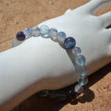 This is a gemstone bracelet consists of Kyanite, Blue Velvet Stone, Aquamarine, and Cordierite.