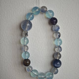 This is a gemstone bracelet consists of Kyanite, Blue Velvet Stone, Aquamarine, and Cordierite.