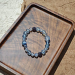 This is a gemstone bracelet consists of Kyanite, Blue Velvet Stone, Aquamarine, and Cordierite.