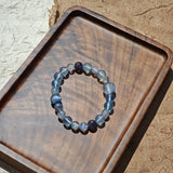 This is a gemstone bracelet consists of Kyanite, Blue Velvet Stone, Aquamarine, and Cordierite.
