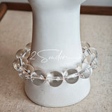 This is a crystal bracelet consists of 1 aquamarine and 13pcs of pure clear quartz.