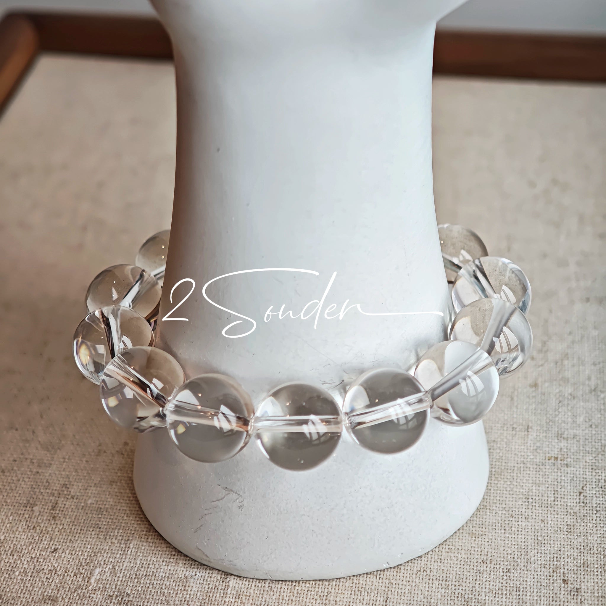 This is a crystal bracelet consists of 1 aquamarine and 13pcs of pure clear quartz.