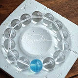 This is a crystal bracelet consists of 1 aquamarine and 13pcs of pure clear quartz.