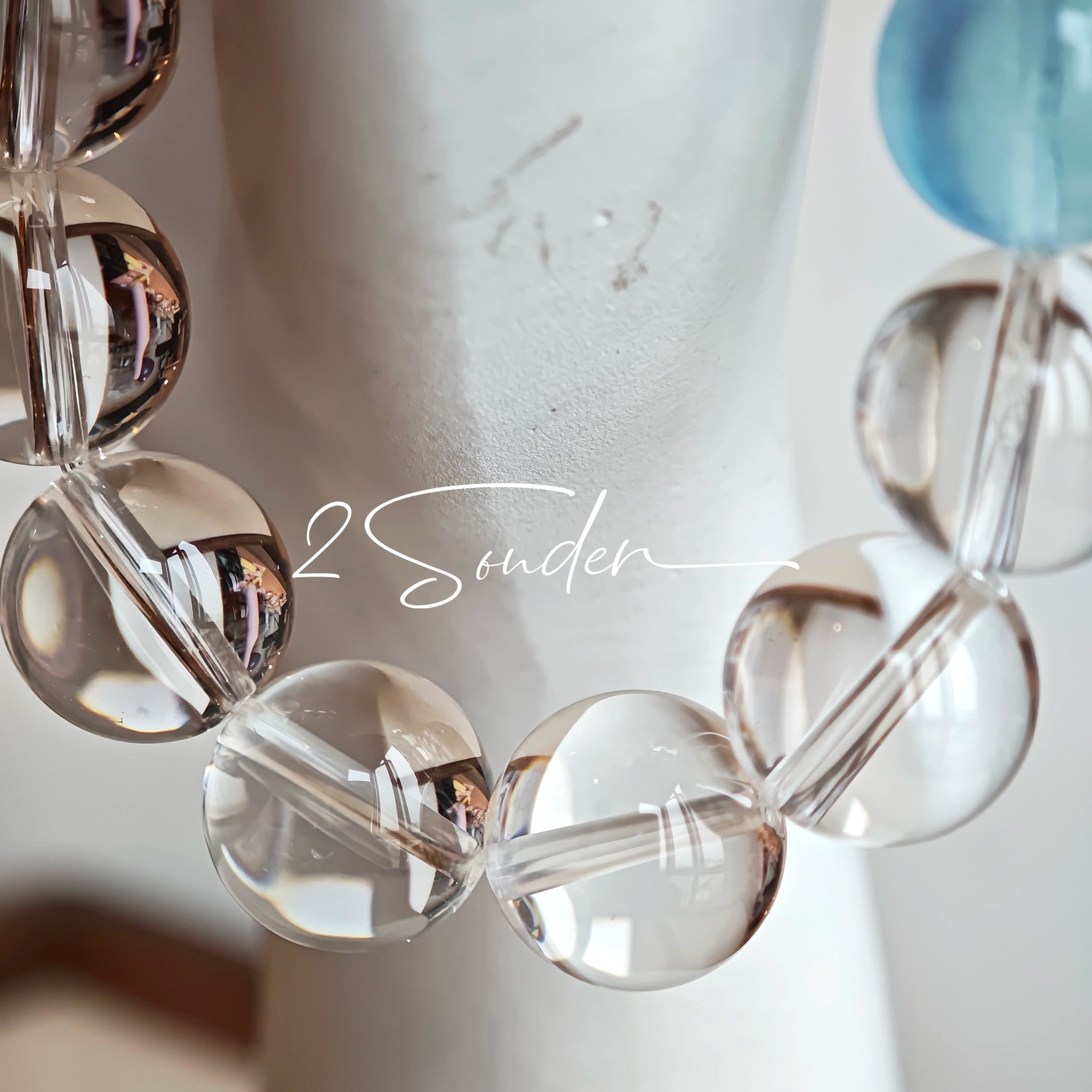 This is a crystal bracelet consists of 1 aquamarine and 13pcs of pure clear quartz.
