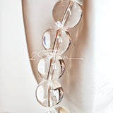 This is a crystal bracelet consists of 1 aquamarine and 13pcs of pure clear quartz.