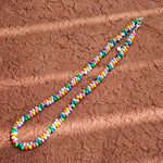 This is a bead necklace that consists of colorful peanut shape beads. It's as colorful as rainbow.