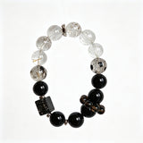 This is a crystal bracelet consists of Black Gold Ultra-Sparkle Azeztulite, Herkimer Diamond, Lace Black Rutilated Quartz, Obsidian and Tea Citrine Running Ring.
