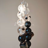 This is a crystal bracelet consists of Black Gold Ultra-Sparkle Azeztulite, Herkimer Diamond, Lace Black Rutilated Quartz, Obsidian and Tea Citrine Running Ring.