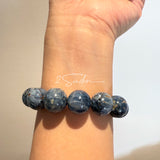 This is a bracelet consists of Blue Denim Pietersite and Golden Sheen Obsidian. The color of the bracelet is denim blue and black, accented by sleek silver spacer.
