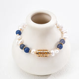 This is a bracelet crafted with S925 silver, blue aventurine, zircon, and pearls. It blends French and Chinese aesthetics and will bring elegance and good fortune.