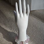 Rose Quartz hearts, White Phantom Quartz clouds, and an agate rabbit charm circle your wrist.