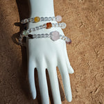 A multi-gemstone bracelet which is made with Silver Sheen Obsidian, Clear Quartz, Amethyst, Rose Quartz, Kyanite, Citrine, and Prehnite, etc. It’s also a necklace.