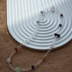 A multi-gemstone bracelet which is made with Silver Sheen Obsidian, Clear Quartz, Amethyst, Rose Quartz, Kyanite, Citrine, and Prehnite, etc. It’s also a necklace.
