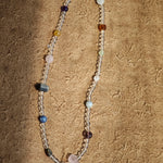 A multi-gemstone bracelet which is made with Silver Sheen Obsidian, Clear Quartz, Amethyst, Rose Quartz, Kyanite, Citrine, and Prehnite, etc. It’s also a necklace.