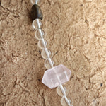 A multi-gemstone bracelet which is made with Silver Sheen Obsidian, Clear Quartz, Amethyst, Rose Quartz, Kyanite, Citrine, and Prehnite, etc. It’s also a necklace.