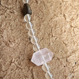 A multi-gemstone bracelet which is made with Silver Sheen Obsidian, Clear Quartz, Amethyst, Rose Quartz, Kyanite, Citrine, and Prehnite, etc. It’s also a necklace.