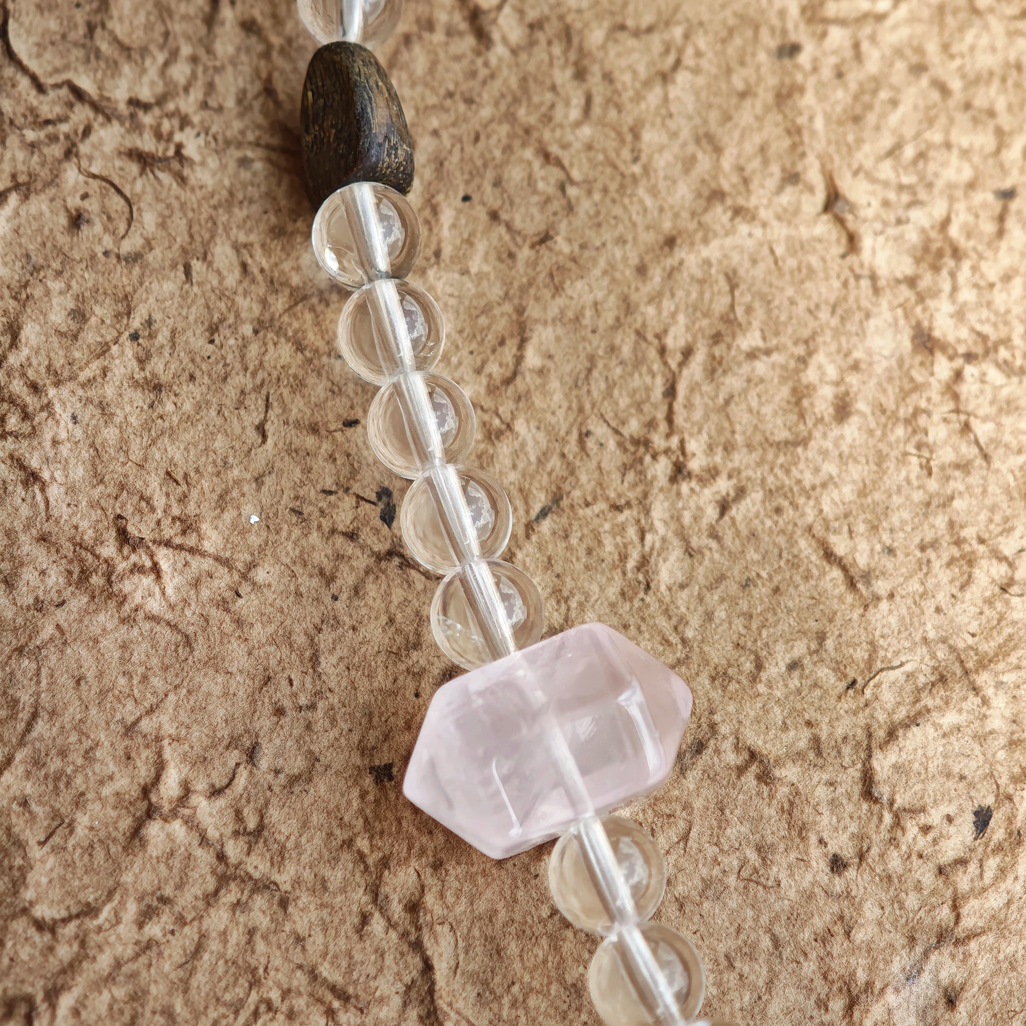 A multi-gemstone bracelet which is made with Silver Sheen Obsidian, Clear Quartz, Amethyst, Rose Quartz, Kyanite, Citrine, and Prehnite, etc. It’s also a necklace.