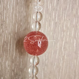 This handcrafted gemstone necklace is a stunning blend of natural crystals, featuring sparkling Herkimer Diamonds, vibrant Brazilian Amethyst, rich Pigeon's Blood Strawberry Quartz, serene Aquamarine, sunny Citrine, and luminous clear quartz, each bead hand-selected for its one-of-a-kind beauty. Strung alongside polished clear quartz spacers and accent stones, the necklace balances bold, colorful statement beads with delicate, shimmering crystal details, creating a piece that feels both earthy and ethereal.