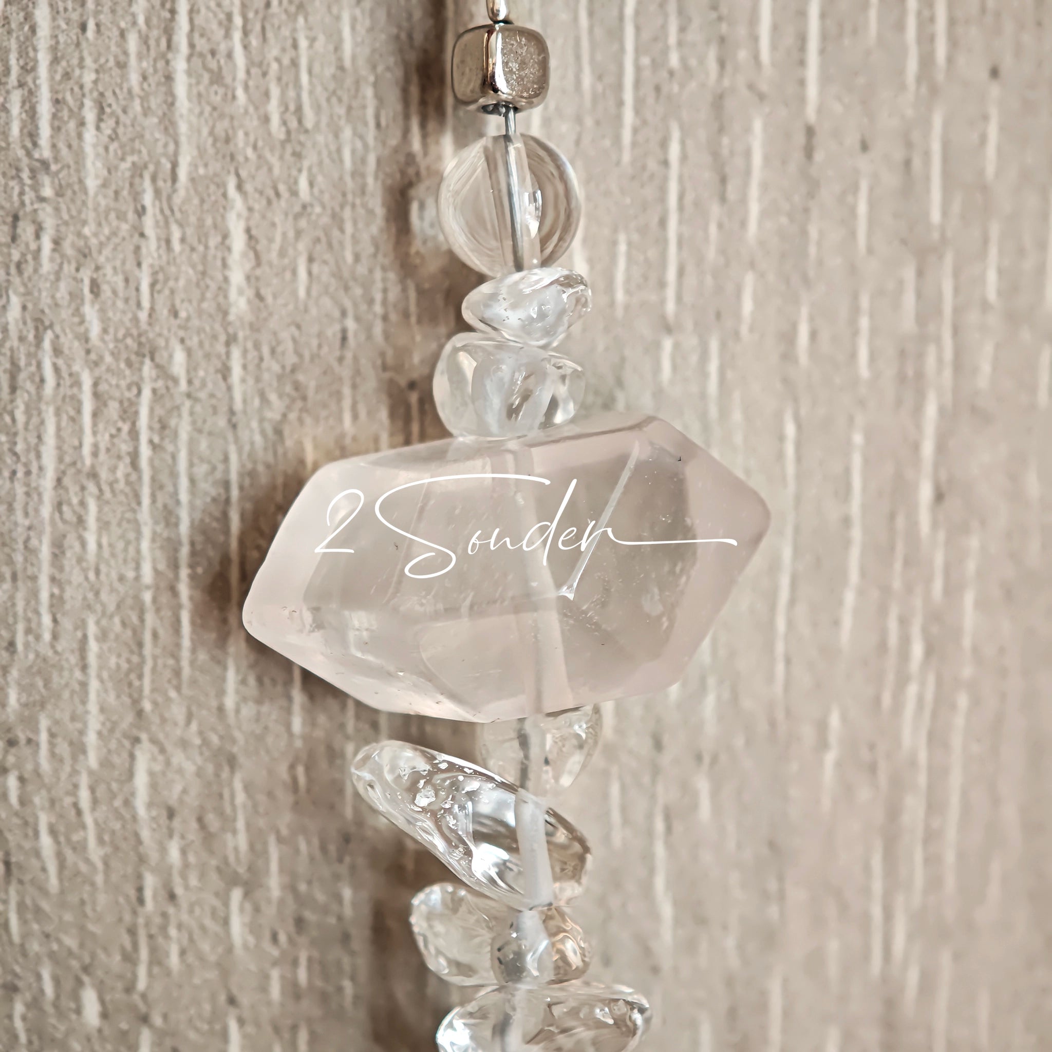 This handcrafted gemstone necklace is a stunning blend of natural crystals, featuring sparkling Herkimer Diamonds, vibrant Brazilian Amethyst, rich Pigeon's Blood Strawberry Quartz, serene Aquamarine, sunny Citrine, and luminous clear quartz, each bead hand-selected for its one-of-a-kind beauty. Strung alongside polished clear quartz spacers and accent stones, the necklace balances bold, colorful statement beads with delicate, shimmering crystal details, creating a piece that feels both earthy and ethereal.