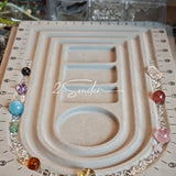 This handcrafted gemstone necklace is a stunning blend of natural crystals, featuring sparkling Herkimer Diamonds, vibrant Brazilian Amethyst, rich Pigeon's Blood Strawberry Quartz, serene Aquamarine, sunny Citrine, and luminous clear quartz, each bead hand-selected for its one-of-a-kind beauty. Strung alongside polished clear quartz spacers and accent stones, the necklace balances bold, colorful statement beads with delicate, shimmering crystal details, creating a piece that feels both earthy and ethereal.