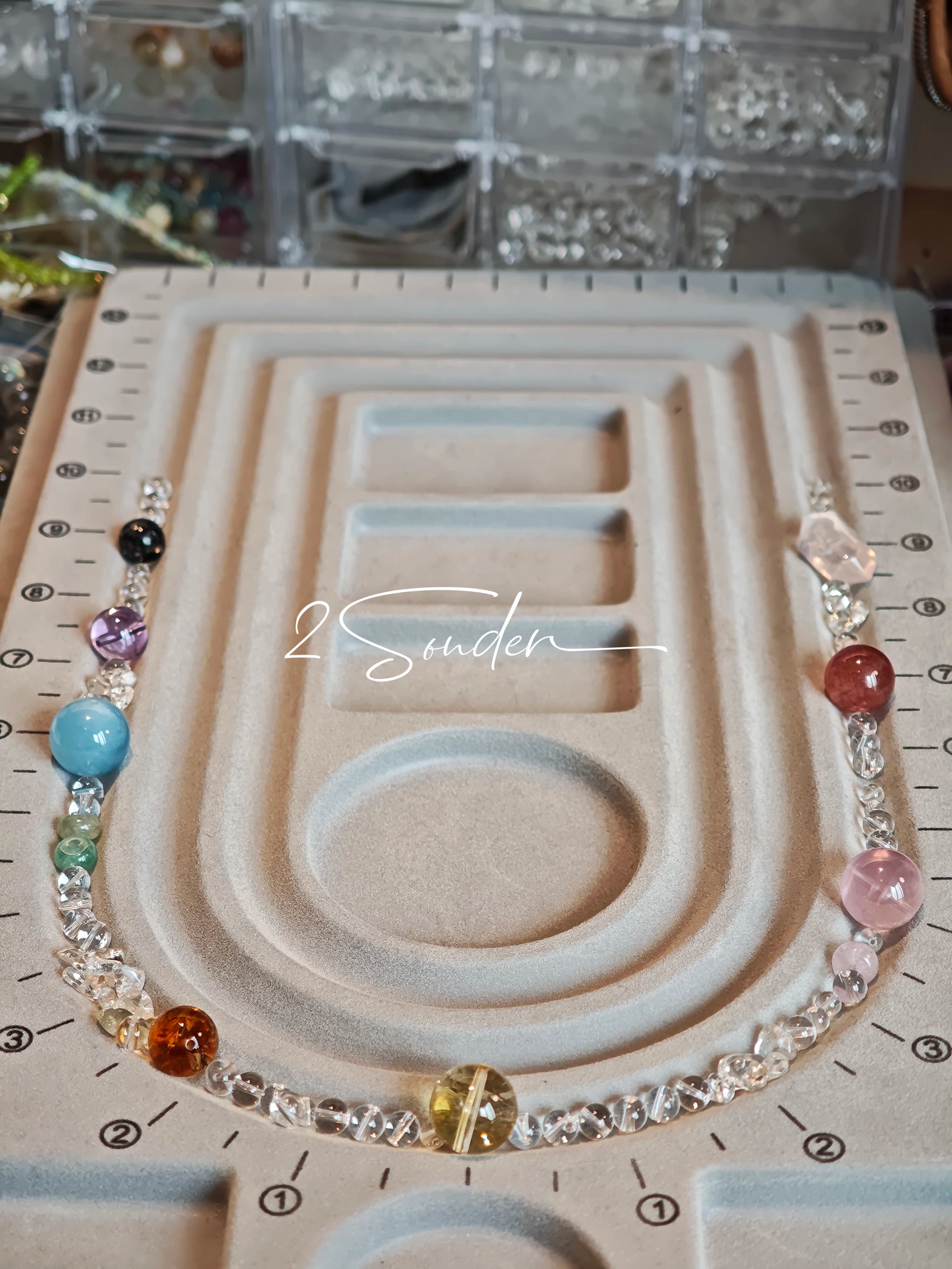 This handcrafted gemstone necklace is a stunning blend of natural crystals, featuring sparkling Herkimer Diamonds, vibrant Brazilian Amethyst, rich Pigeon's Blood Strawberry Quartz, serene Aquamarine, sunny Citrine, and luminous clear quartz, each bead hand-selected for its one-of-a-kind beauty. Strung alongside polished clear quartz spacers and accent stones, the necklace balances bold, colorful statement beads with delicate, shimmering crystal details, creating a piece that feels both earthy and ethereal.