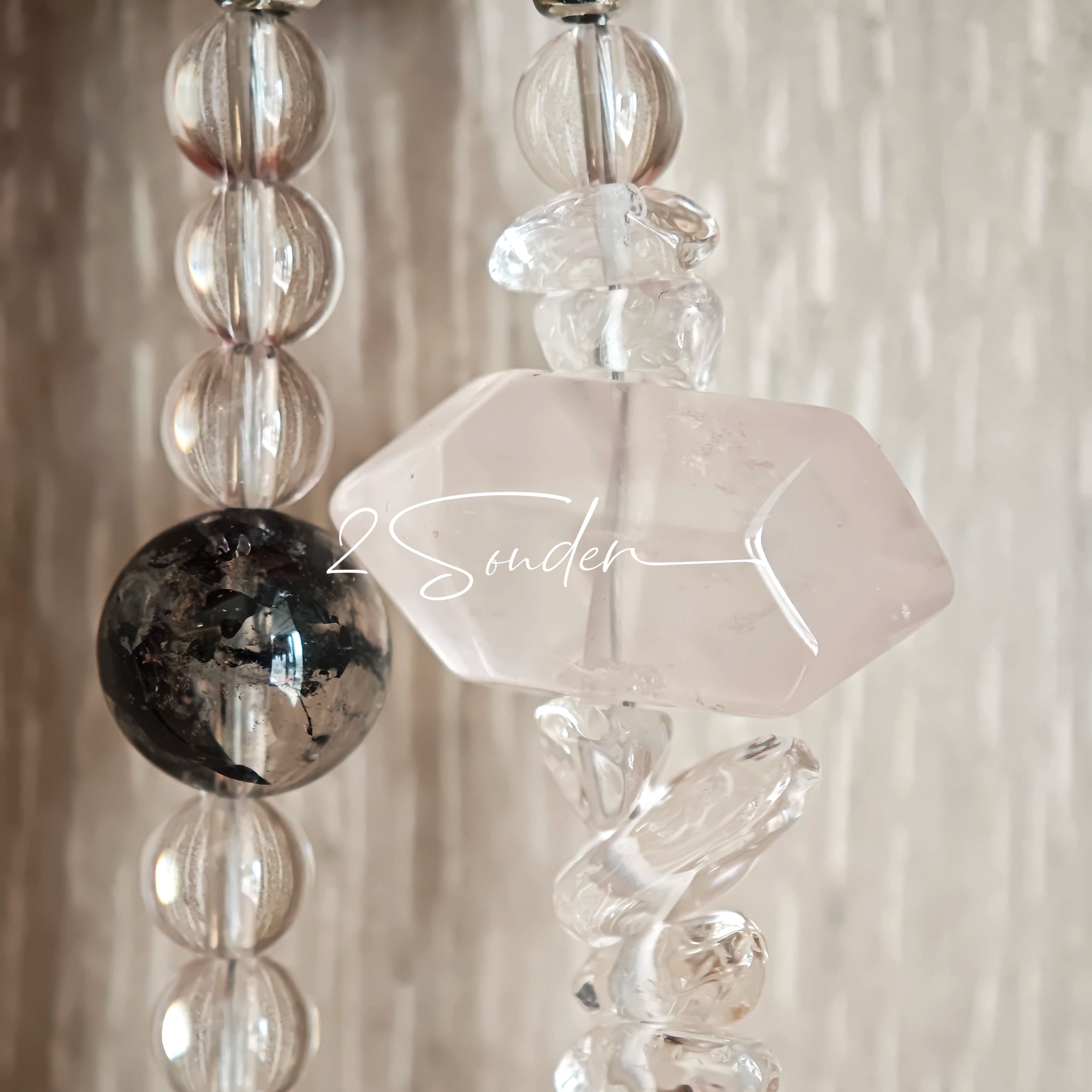 This handcrafted gemstone necklace is a stunning blend of natural crystals, featuring sparkling Herkimer Diamonds, vibrant Brazilian Amethyst, rich Pigeon's Blood Strawberry Quartz, serene Aquamarine, sunny Citrine, and luminous clear quartz, each bead hand-selected for its one-of-a-kind beauty. Strung alongside polished clear quartz spacers and accent stones, the necklace balances bold, colorful statement beads with delicate, shimmering crystal details, creating a piece that feels both earthy and ethereal.
