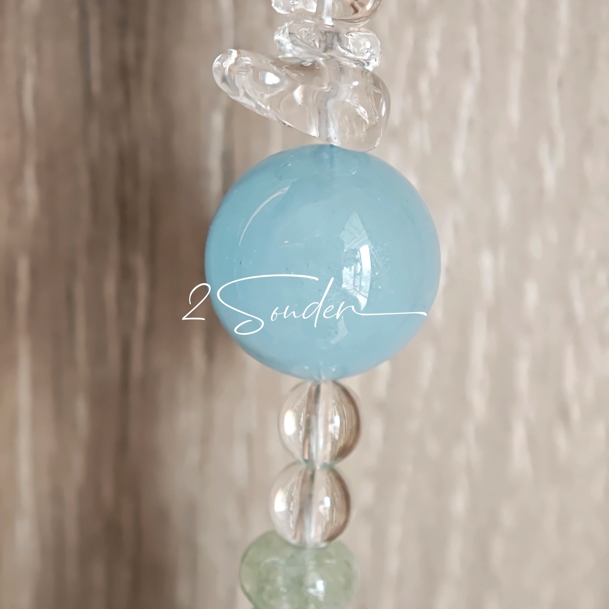 This handcrafted gemstone necklace is a stunning blend of natural crystals, featuring sparkling Herkimer Diamonds, vibrant Brazilian Amethyst, rich Pigeon's Blood Strawberry Quartz, serene Aquamarine, sunny Citrine, and luminous clear quartz, each bead hand-selected for its one-of-a-kind beauty. Strung alongside polished clear quartz spacers and accent stones, the necklace balances bold, colorful statement beads with delicate, shimmering crystal details, creating a piece that feels both earthy and ethereal.