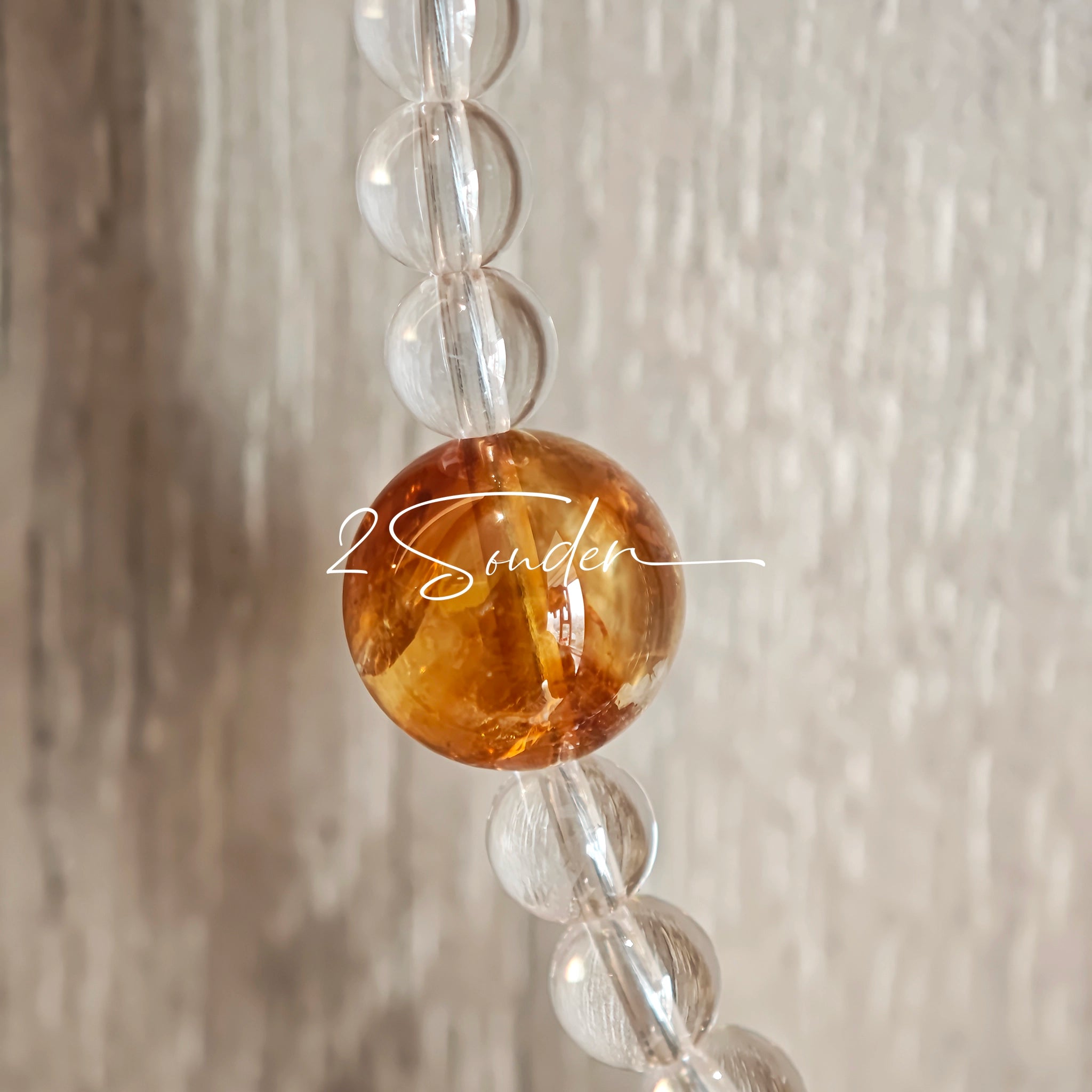 This handcrafted gemstone necklace is a stunning blend of natural crystals, featuring sparkling Herkimer Diamonds, vibrant Brazilian Amethyst, rich Pigeon's Blood Strawberry Quartz, serene Aquamarine, sunny Citrine, and luminous clear quartz, each bead hand-selected for its one-of-a-kind beauty. Strung alongside polished clear quartz spacers and accent stones, the necklace balances bold, colorful statement beads with delicate, shimmering crystal details, creating a piece that feels both earthy and ethereal.