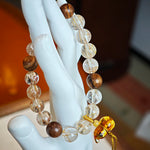 Crystals full of copper sunbeams rest on agarwood clouds, then descend into a Nanhong flower-gourd of guardianship.