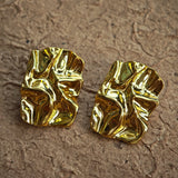 Classic Black and Gold Stud Earrings with Geometric Shape