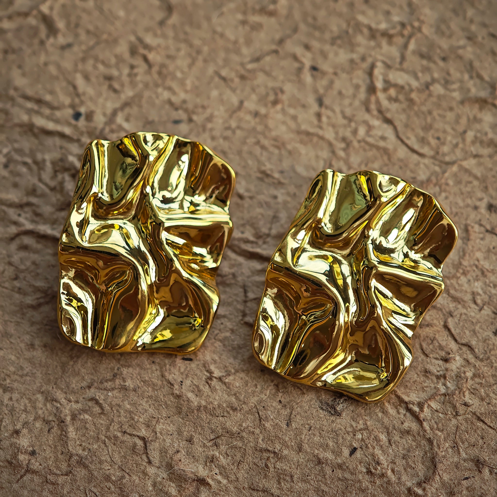 Classic Black and Gold Stud Earrings with Geometric Shape