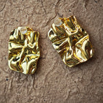 Classic Black and Gold Stud Earrings with Geometric Shape