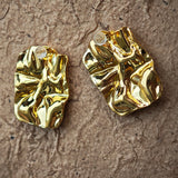 Classic Black and Gold Stud Earrings with Geometric Shape