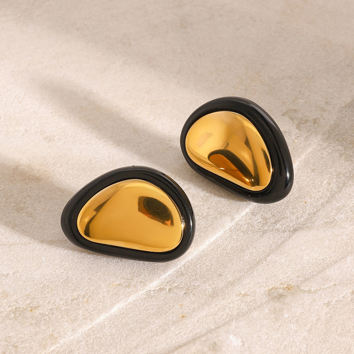 Classic Black and Gold Stud Earrings with Geometric Shape