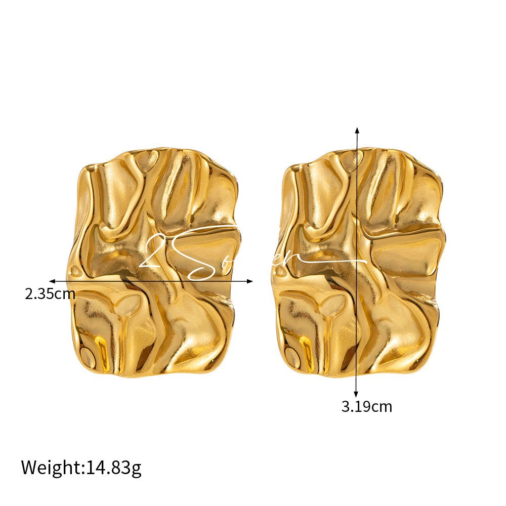 Classic Black and Gold Stud Earrings with Geometric Shape.